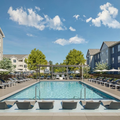 a swimming pool surrounded by buildings