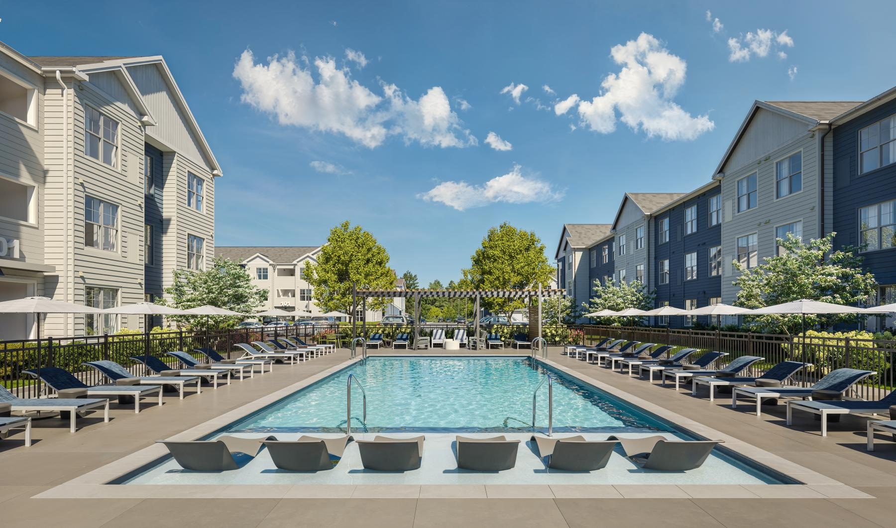 a swimming pool surrounded by buildings