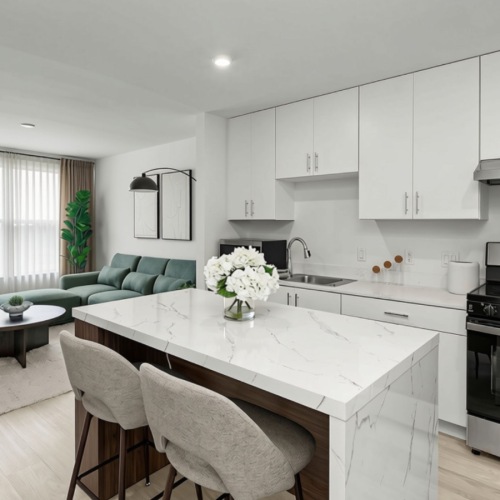 Kitchen with stainless steel appliances and space for a table or moveable island