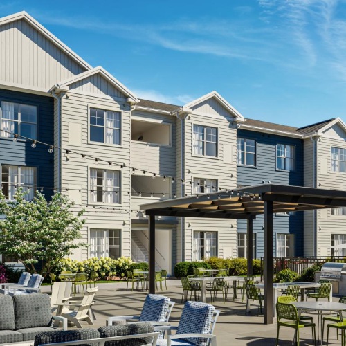 a building with tables and chairs outside